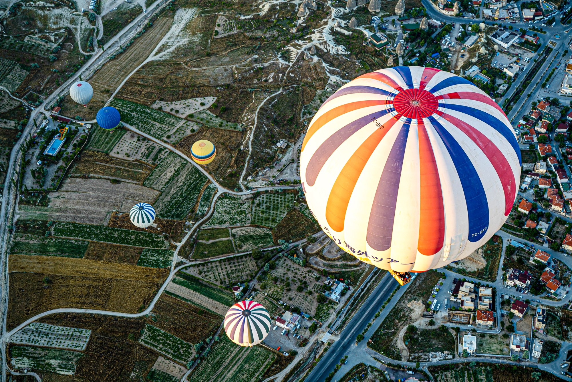 Balloons above the Cappadocia landscape
